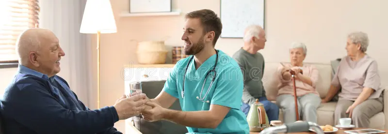 Elderly care professional providing compassionate care to a senior